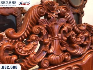 Bộ ghế hoàng gia gỗ hương đá 10 món (Anh Nam - Quảng Bình) 65 Hoạ tiết đục trên đỉnh ghế