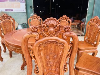 Mẫu bàn ăn tròn 8 ghế hồng hạt gỗ hương đá hàng vip (Anh Tiến, Hoàng Mai) 17 chương ghế đục vòm hoa lá tây